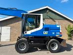 Caterpillar M315 (bj 2000), Graafmachine