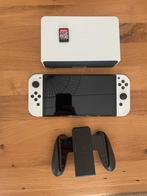 Nintendo Switch OLED + Mario Kart 8 Deluxe, Spelcomputers en Games, Spelcomputers | Nintendo Switch, Met games, Zo goed als nieuw
