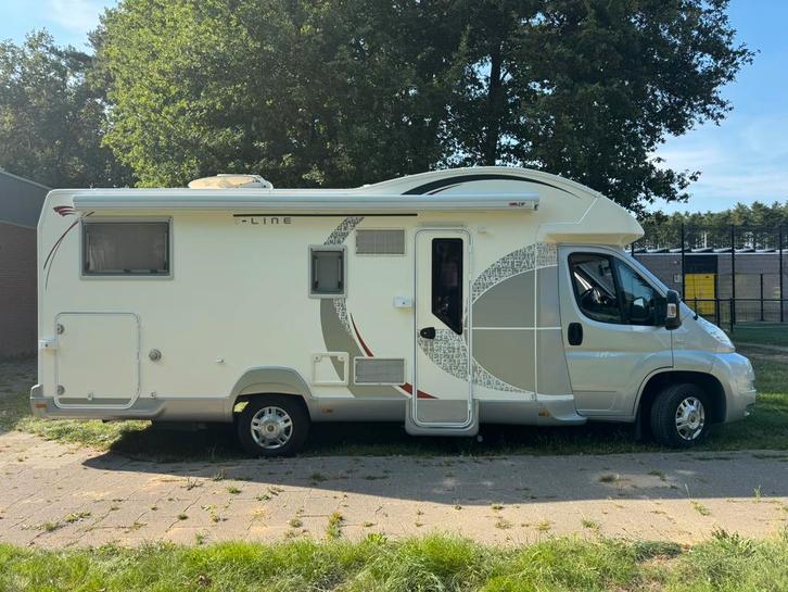 Roller Team T-line 285 M, lengtebedden, 2012, winterproof, Caravans en Kamperen, Campers, Particulier, tot en met 4, Half-integraal