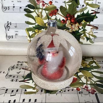 Antiek oude kerstbal gesuikerd met kerstman erin beschikbaar voor biedingen