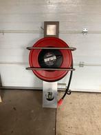 Nieuwe Noha brandslanghaspel op statief, Ophalen