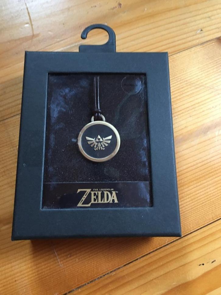 The Legend Of Zelda Hyrule Ketting, Sieraden, Tassen en Uiterlijk, Kettingen, Zo goed als nieuw, Overige materialen, Goud, Met hanger