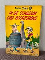 Lucky Luke 18: In de Schaduw der Boortorens, Eén stripboek, Ophalen of Verzenden, Gelezen