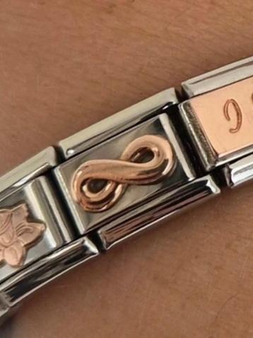 Nomination infinity link roségoud  beschikbaar voor biedingen