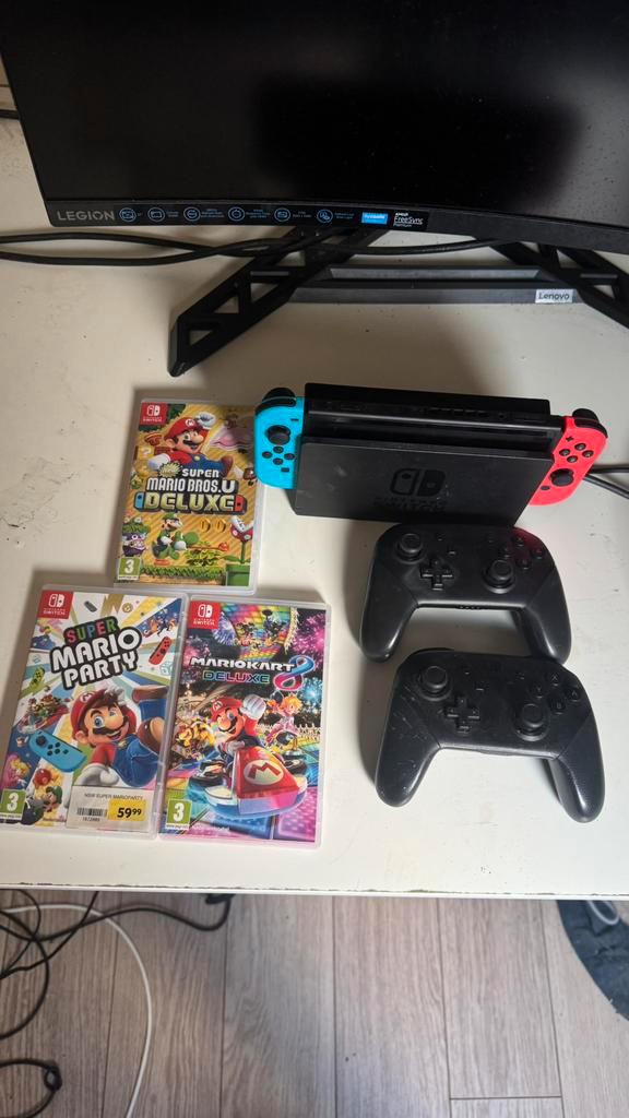 Nintendo Switch+2 Pro Controllers+ 3 Mario Games AANBIEDING!, Spelcomputers en Games, Spelcomputers | Nintendo Wii, Zo goed als nieuw