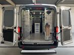 Ford Transit Servicewagen 350 2.0 TDCI 131pk euro6 L2H2 Tren, Auto's, Stof, 4 cilinders, Met garantie (alle), 2800 kg
