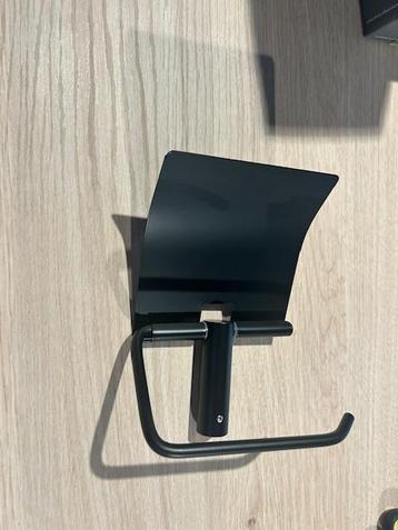 Toilet rol houder beschikbaar voor biedingen