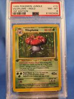 Vileplume 15/64 - Jungle (1st edition) (PSA 8), Hobby en Vrije tijd, Verzamelkaartspellen | Pokémon, Verzenden, Gebruikt