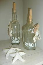 2x glazen flessen Beach Ibiza look, Huis en Inrichting, Zo goed als nieuw, Ophalen