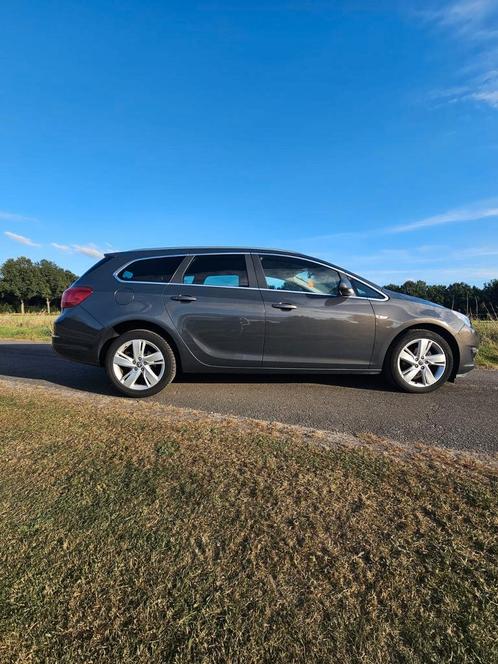 Opel Astra 1.4 Turbo 88KW Sports Tourer 2014 Grijs, Auto's, Opel, Particulier, Astra, Benzine, B, Stationwagon, Handgeschakeld