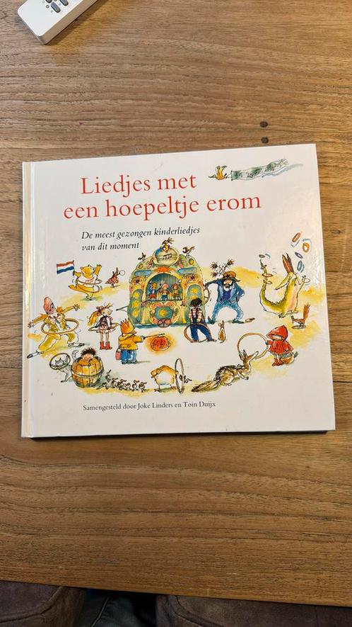 T. Duijx - Liedjes met een hoepeltje erom, Boeken, Kinderboeken | Jeugd | onder 10 jaar, Zo goed als nieuw, Ophalen of Verzenden
