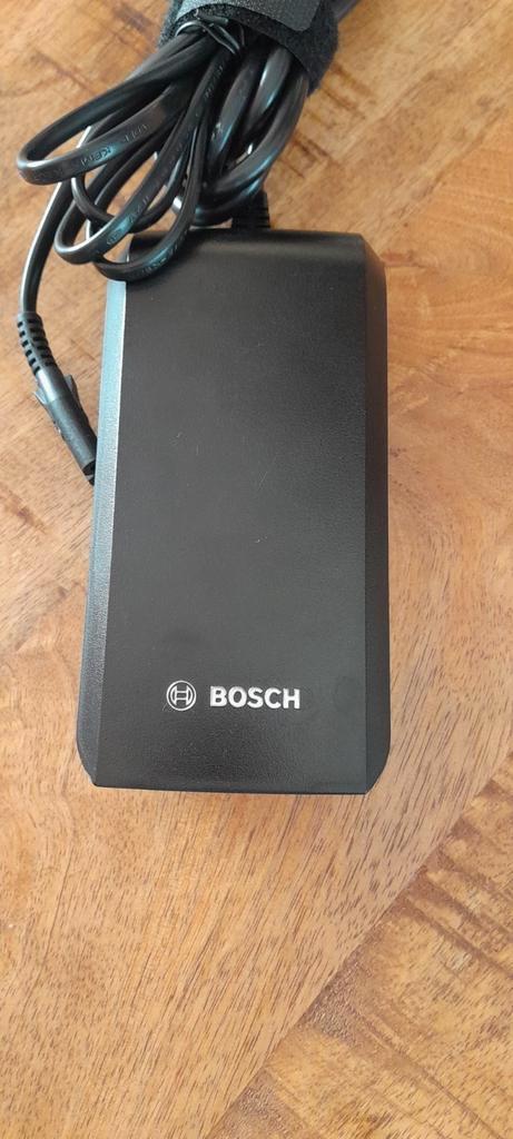 Bosch fietsaccu lader 2A, Fietsen en Brommers, Fietsaccessoires | Fietsaccu's, Nieuw, Ophalen
