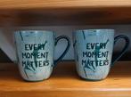 2 HEMA porseleinen mokken "Every moment matters", Huis en Inrichting, Keuken | Servies, Ophalen of Verzenden, Zo goed als nieuw