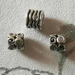 Pandora met zirkonia's, spiraaltjes en golven in nieuwstaat, Verzenden, Pandora, Zo goed als nieuw, 2 of 3 bedels