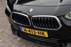BMW X2 sDrive20i | Panodak | Sportstoelen | Camera | Trekhaa, 1998 cc, Euro 6, 1435 kg, Zwart