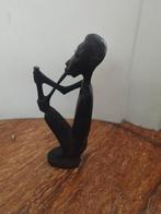 Afrikaans beeldje handgemaakt, Ophalen