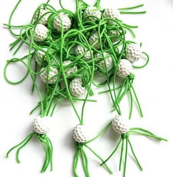 Gelukspoppetje golfbal beschikbaar voor biedingen