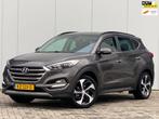 Hyundai Tucson 1.6 T-GDi Premium 4WD, Auto's, Gebruikt, 4 cilinders, Bruin, Lichtsensor