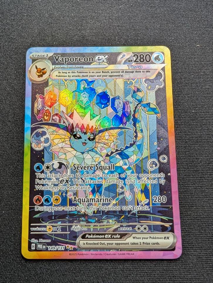 Vaporeon ex 149/131 (Set: Prismatic Evolutions), Hobby en Vrije tijd, Verzamelkaartspellen | Pokémon, Zo goed als nieuw, Losse kaart