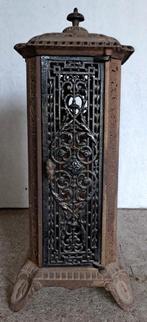 Oude gietijzeren kachel met ornamenten, Antiek en Kunst, Curiosa en Brocante, Ophalen