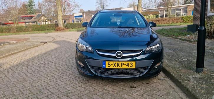 Opel Astra 1.4 Turbo 103KW ST 2014 Groen, Auto's, Opel, Astra, Benzine, B, Stationwagon, Handgeschakeld, Origineel Nederlands