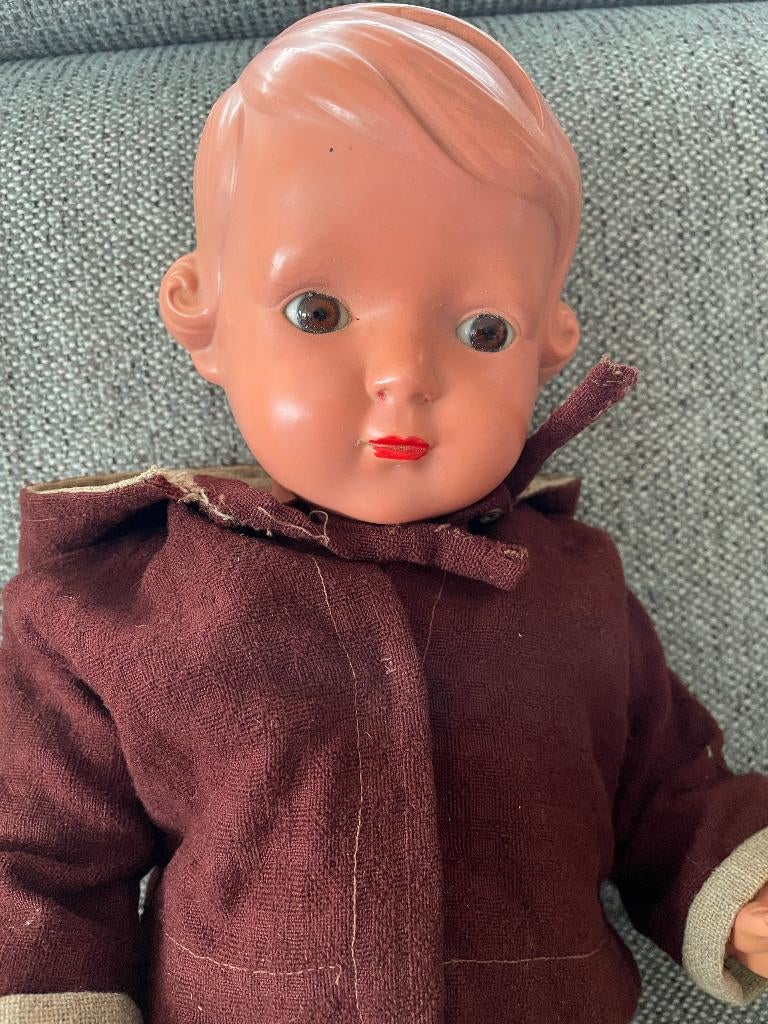 Te koop, antieke schildpad pop, compleet met kleding., Ophalen of Verzenden