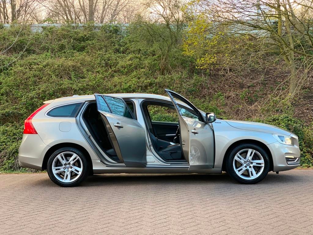 Volvo V60 2.4 D5 Twin Engine Special Edition AUT LEDER NAVI, Auto's, Volvo, Automaat, Euro 6, Bruin, 163 pk