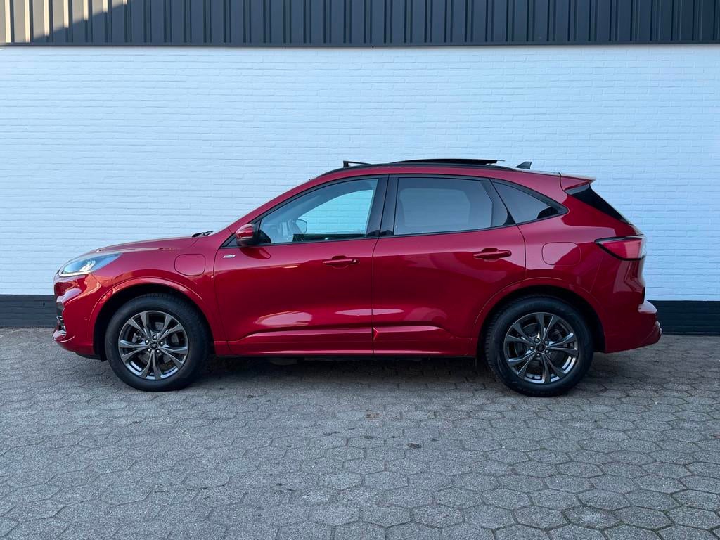 Ford Kuga 2.5PHEV ST-Line PANO l ACC l TREKHAAK l 360 CAMERA, Auto's, Stof, Gebruikt, Zwart, 4 cilinders