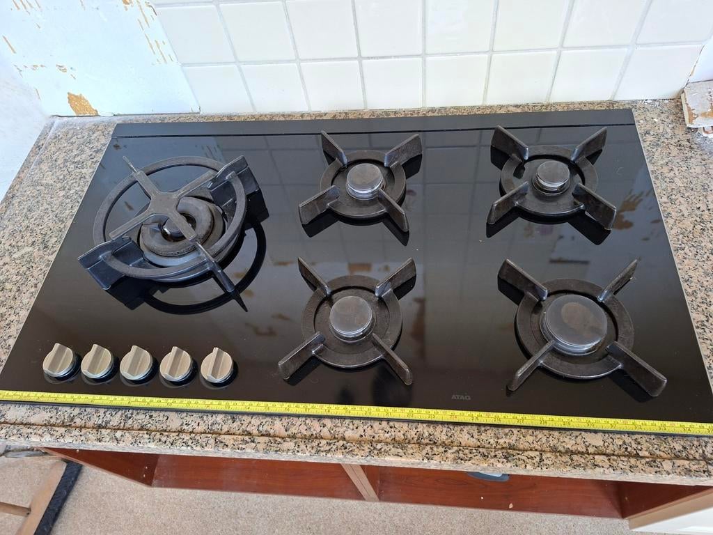 ATAG kookplaat met wokbrander, gietijzer, 90x52 cm glas, Witgoed en Apparatuur, Kookplaten, Ophalen, Gebruikt, Inbouw, Gas