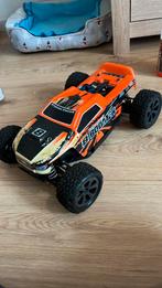 Kleur: Oranje met wit en zwart grote: 42 cm lang en 30 cm br, Hobby en Vrije tijd, Modelbouw | Radiografisch | Auto's, Ophalen