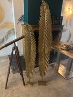 Metalen veren kunstobjecten, Ophalen