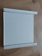 Plank tussen wasmachine en droger, Ophalen