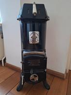 antieke zwarte kachel, Ophalen
