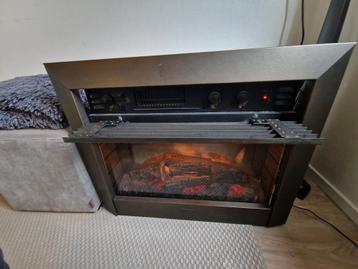 Elektrische haard, bewegende vlammen beschikbaar voor biedingen