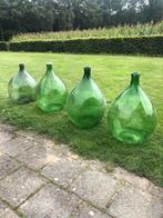 Te koop grote wijnflessen, Ophalen