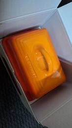 Botervlootje Le Creuset oranje, Ophalen