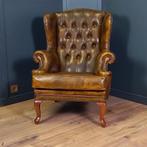 Cognackleurige Chesterfield wingback fauteuil (2x), Huis en Inrichting, Fauteuils, Chesterfield, Ophalen of Verzenden, 75 tot 100 cm