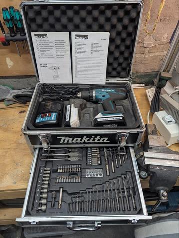 Makita accuboormachine DF457DWEX2 + 70-delige accessoireset beschikbaar voor biedingen