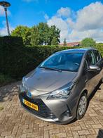 Toyota Yaris 1.5 Hybrid 100pk CVT 2020 Grijs, Auto's, 1497 cc, 4 cilinders, Origineel Nederlands, 48 €/maand