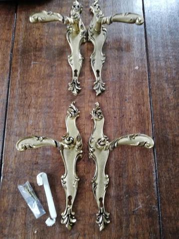 4 x prachtige oude sierlijk bewerkte deurklinken ongebruikt beschikbaar voor biedingen