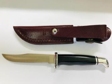 Vintage Buck 102 Woodsman Fixed,1994 phenolic Fixed blade me