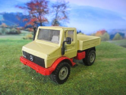 1/55 Mercedes Benz Unimog U1500 met dieplader i.z.g.st., Hobby en Vrije tijd, Modelauto's | 1:50, Gebruikt, Bus of Vrachtwagen