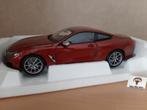 BMW M850i uit 2019 in Orange Metallic van Norev HQ 1:18