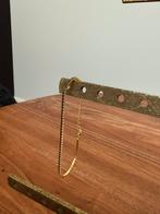 Armbandje goud (verguld) met zwarte steentjes, Ophalen of Verzenden, Zo goed als nieuw