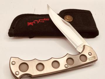 Buck XLTi Model No 560 Silver 1993 Finger Groove Titanium + beschikbaar voor biedingen