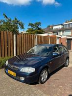 Mazda 323 1.5 F LX 2000 Blauw, Auto's, Mazda, 1498 cc, Zwart, 4 cilinders, Origineel Nederlands