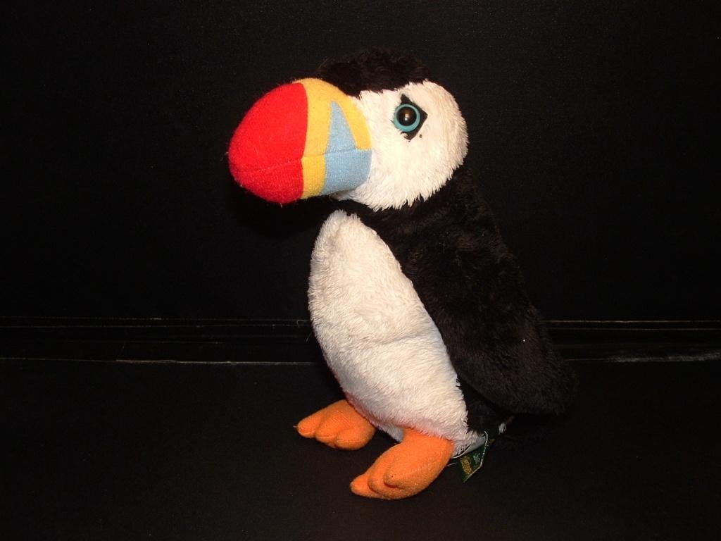 RAVENSDEN PAPEGAAIDUIKER VOGEL PLUCHE ZWART/WIT MET ORANJE, Verzenden, Nieuw, Overige typen