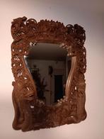 Houten spiegel met snijwerk uit Indonesië, Ophalen