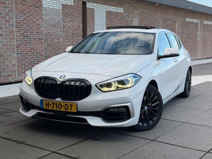 BMW 1-Serie 118i F40 140pk Aut 2020 Wit, Auto's, BMW, Bedrijf, 1-Serie, Achteruitrijcamera, Adaptive Cruise Control, Airbags, Airconditioning