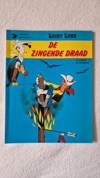 Lucky Luke - De Zingende Draad (1977), Eén stripboek, Ophalen of Verzenden, Gelezen, Morris & Goscinny